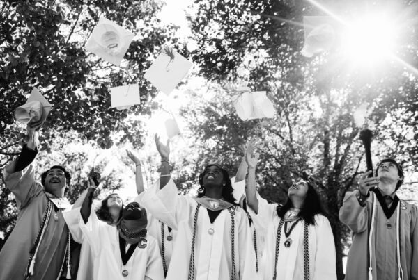 caprock grads throwing hats in the air